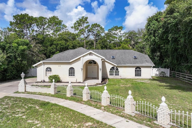 view of front of home with a front lawn