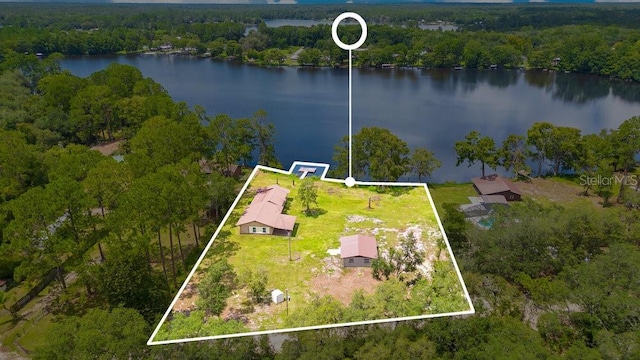 birds eye view of property featuring a water view