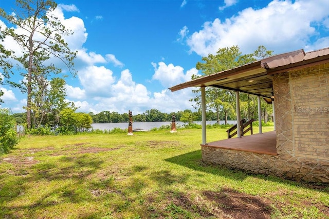 view of yard with a water view