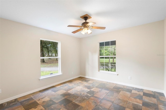 spare room featuring ceiling fan