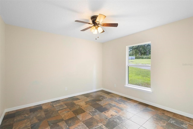 empty room featuring ceiling fan