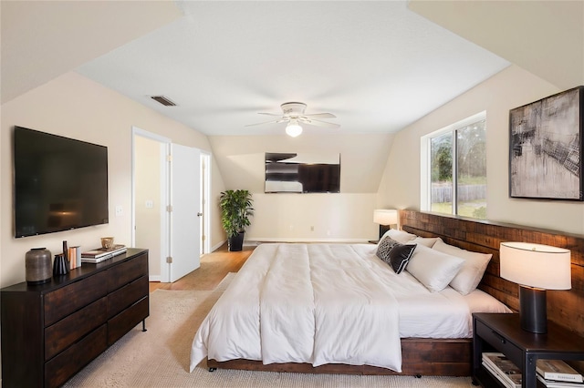 bedroom featuring ceiling fan and vaulted ceiling