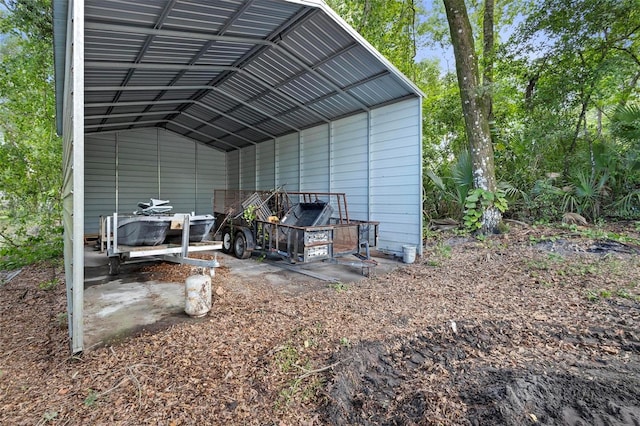 view of outbuilding with a carport