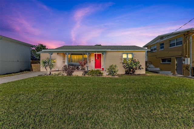 view of front of home featuring a yard