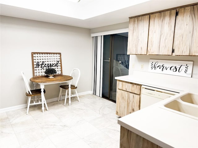 kitchen featuring white dishwasher