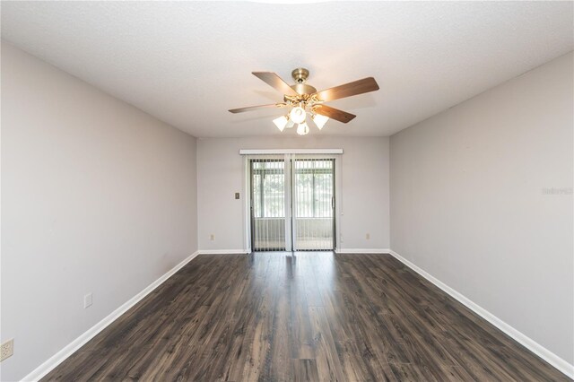 34 Fairway Dr Unit 1, Debary, FL 32713 - empty room featuring dark wood-style flooring and a ceiling fan