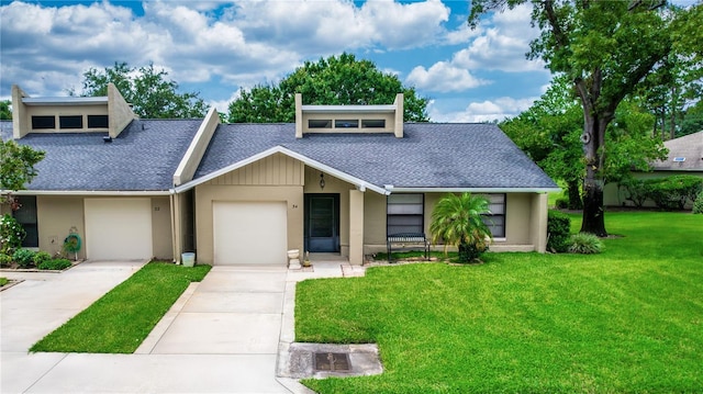 34 Fairway Dr Unit 1, Debary, FL 32713 - mid-century inspired home with a shingled roof, a front lawn, driveway, and stucco siding