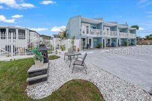 view of property's community with a patio