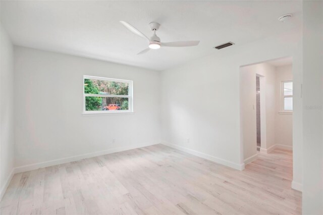 unfurnished room featuring ceiling fan and light hardwood / wood-style flooring