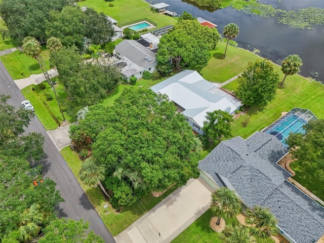 birds eye view of property with a water view