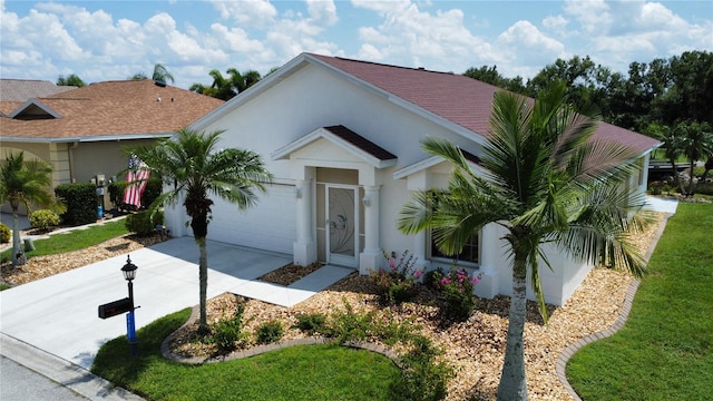 ranch-style home featuring a garage