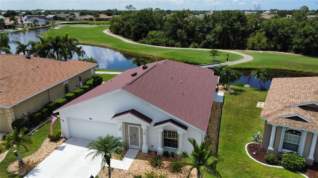 aerial view featuring a water view