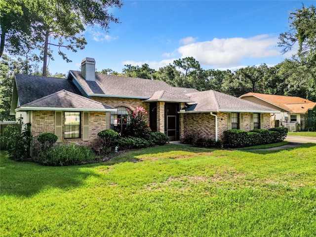 ranch-style house with a front yard