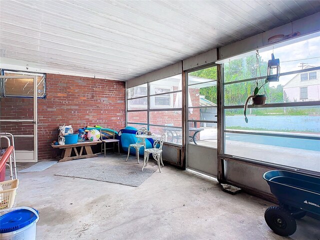 sunroom / solarium with a healthy amount of sunlight