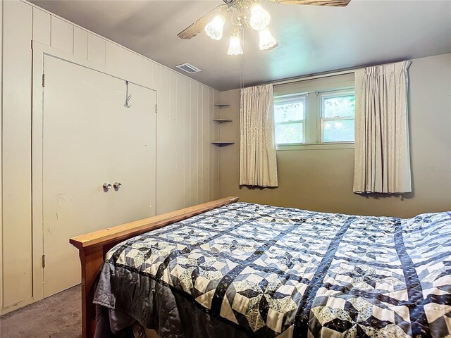 bedroom featuring ceiling fan and carpet floors