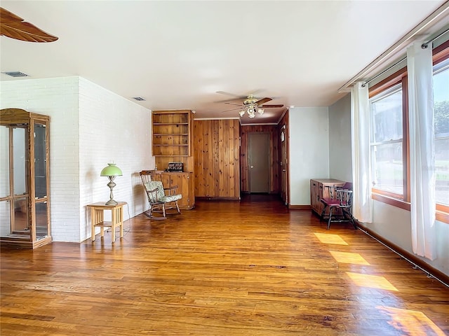 spare room with hardwood / wood-style flooring and ceiling fan