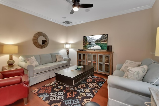 living room featuring crown molding, ceiling fan, and hardwood / wood-style flooring