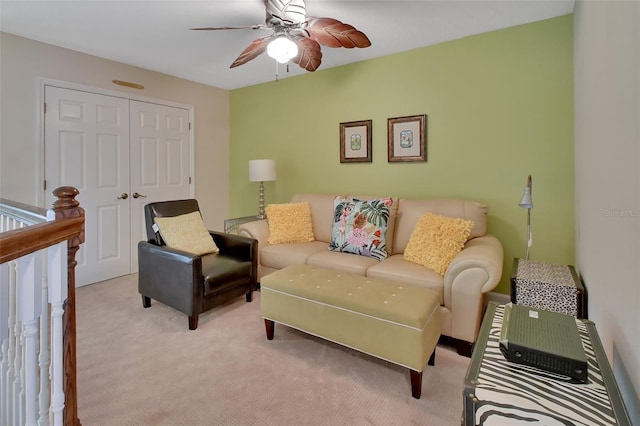 living room with carpet floors and ceiling fan