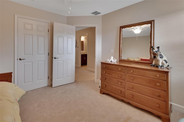 bedroom featuring ceiling fan and light colored carpet