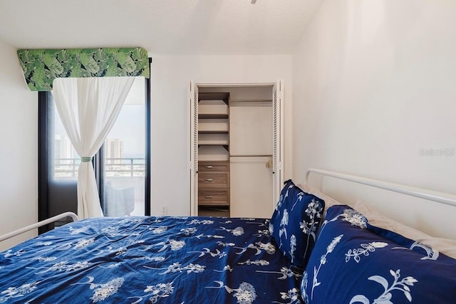 bedroom featuring a textured ceiling