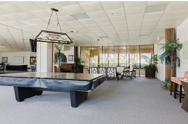 rec room with pool table, a paneled ceiling, and carpet