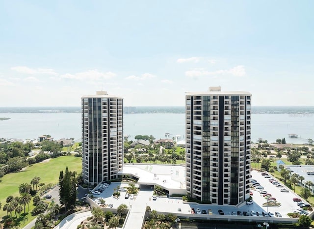 birds eye view of property with a water view