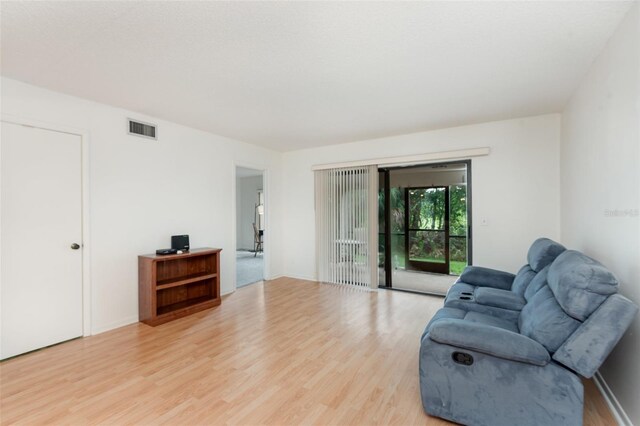 living room with light wood-type flooring