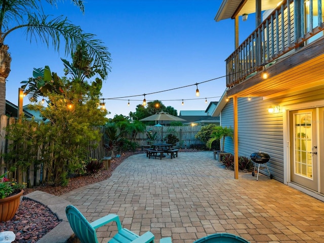 view of patio with a fenced backyard and area for grilling