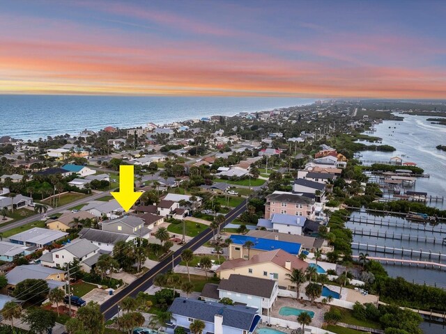 aerial view with a water view and a residential view