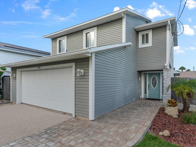 view of front of property featuring a garage