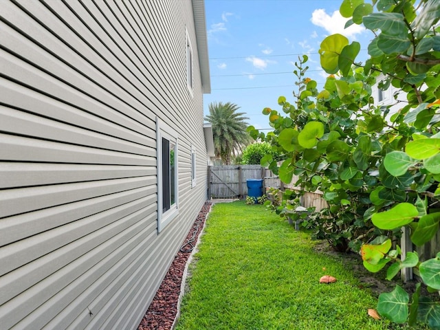 view of yard with a gate and fence