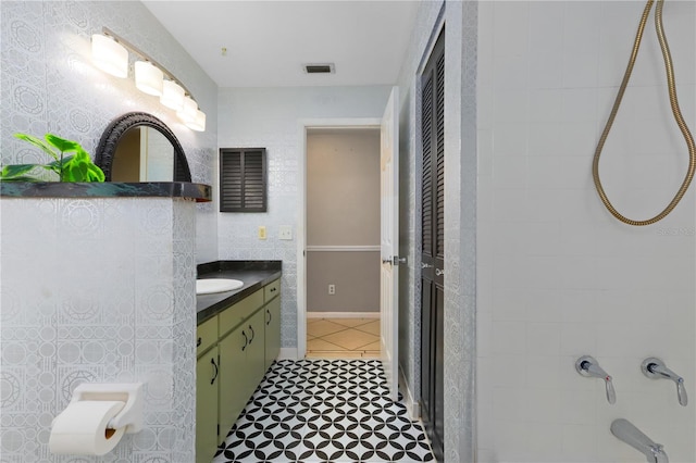 bathroom featuring vanity and tile patterned flooring