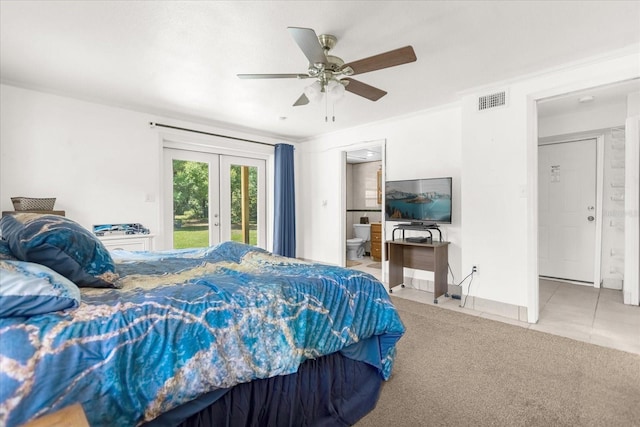 carpeted bedroom featuring ceiling fan, ensuite bath, access to outside, and french doors