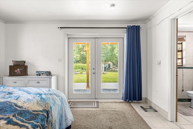 bedroom featuring tile walls, french doors, access to exterior, light tile patterned floors, and ornamental molding