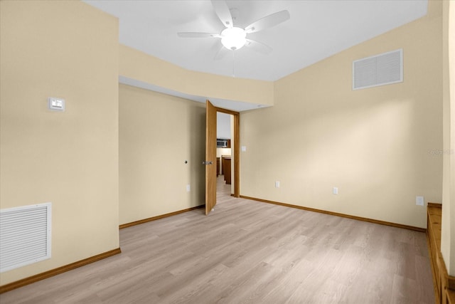 unfurnished room featuring ceiling fan and light wood-type flooring