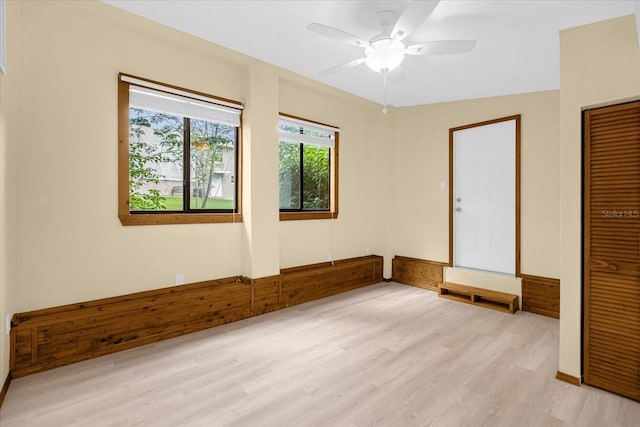 unfurnished bedroom featuring ceiling fan and light hardwood / wood-style flooring