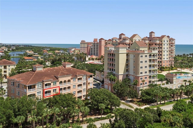 view of building exterior with a water view