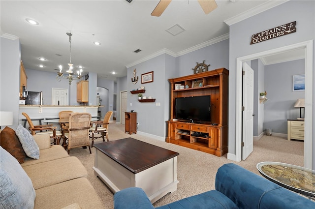 living area featuring light carpet, ornamental molding, ceiling fan with notable chandelier, and baseboards