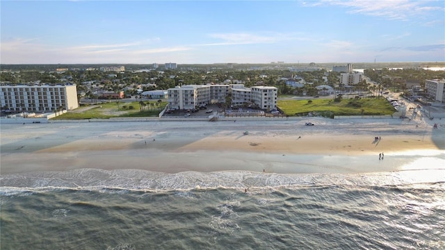 aerial view featuring a water view and a view of the beach