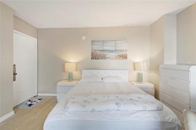 bedroom featuring light hardwood / wood-style floors