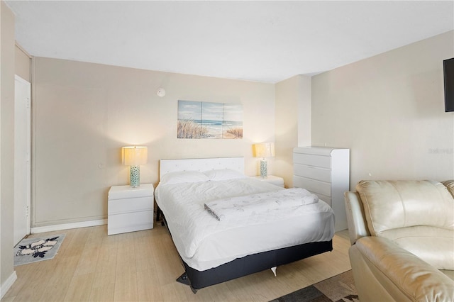 bedroom featuring light hardwood / wood-style floors