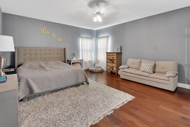 bedroom with wood-type flooring