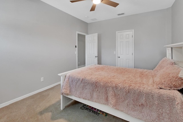 bedroom with ceiling fan and carpet flooring