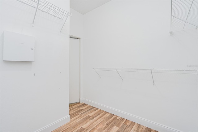 spacious closet with light wood finished floors