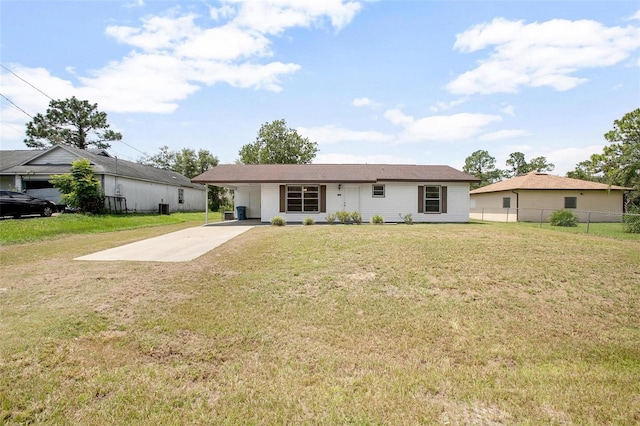 back of house with a yard