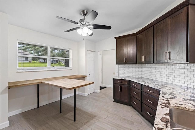 interior space with ceiling fan and light hardwood / wood-style floors