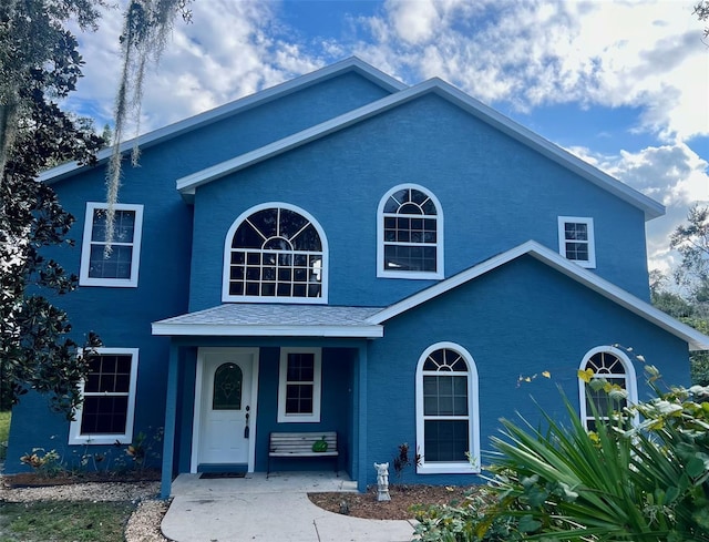 front of property featuring covered porch