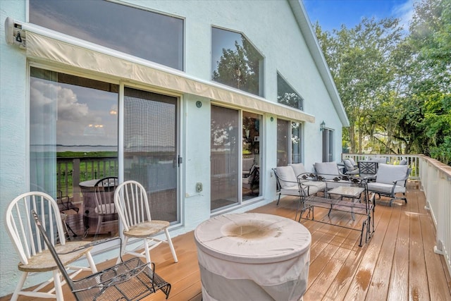 deck featuring an outdoor living space