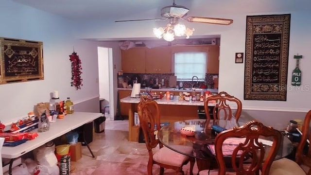 dining area with ceiling fan