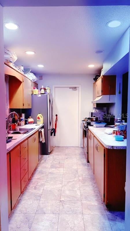 kitchen with appliances with stainless steel finishes and sink